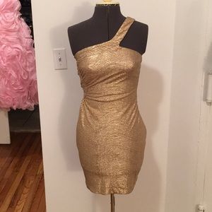 Gold mini dress with open back